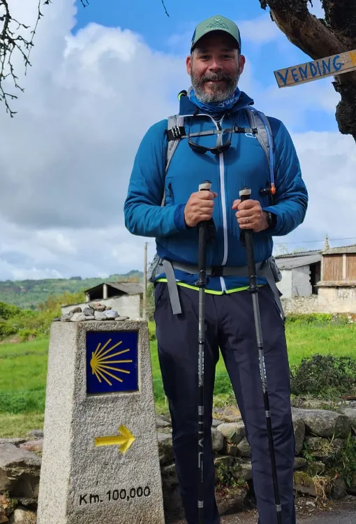 Pedro at the 100 km milestone of the Camino de Santiago